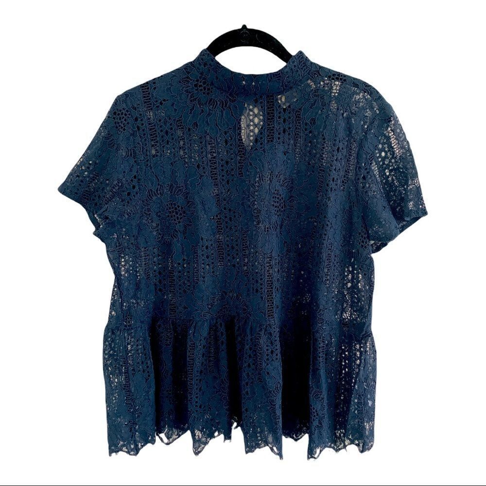 Navy Lacy Peplum Top by Everleigh M